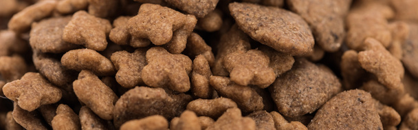 close up view of fresh dry pet food, panoramic shot - Zdjęcie, obraz