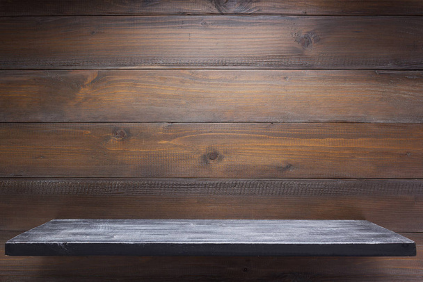 wooden shelf at wall  - 写真・画像