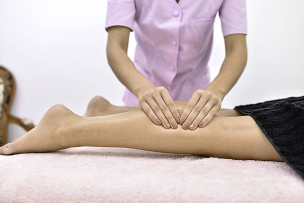 professional relaxing and invigorating massage - Photo, Image