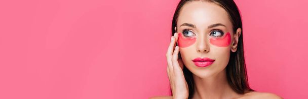 naked beautiful woman touching eye patch on face isolated on pink, panoramic shot - Fotografie, Obrázek
