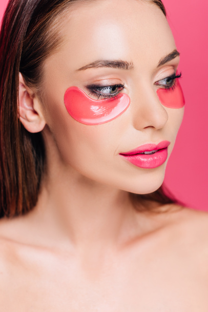 naked beautiful woman with eye patch on face isolated on pink  - Photo, image