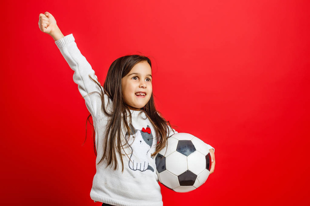 Little young girl with soccer ball  - Foto, Imagem
