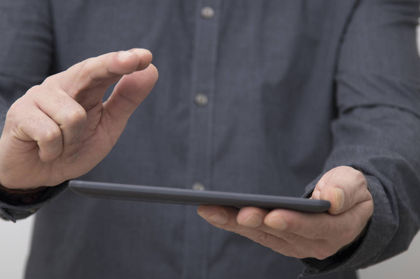 closeup of businessman hands with tablet or digital book - Zdjęcie, obraz