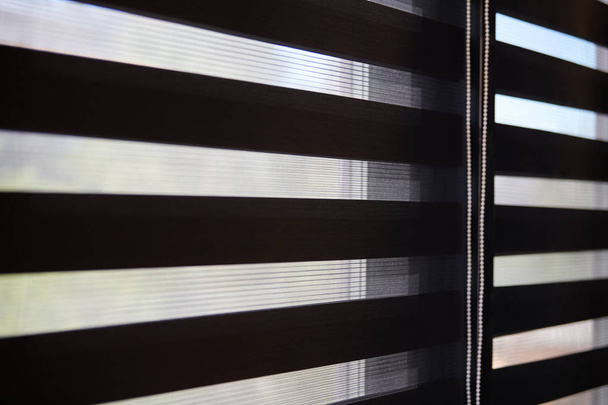 Office blinds. Modern fabric blinds. Office meeting room lighting range control. - Photo, Image