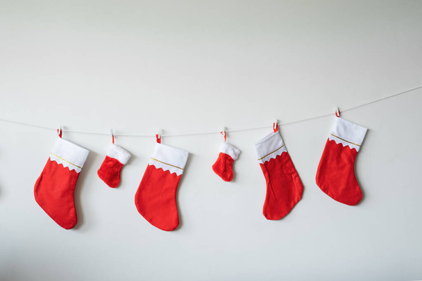 Christmas socks decoration toy hanging against wall for Christma - Photo, Image