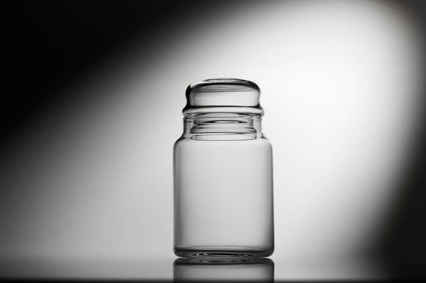 Empty glass jar on a white background - Foto, Imagen