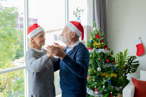 senior elderly caucasian old man and woman dancing together in l - 写真・画像