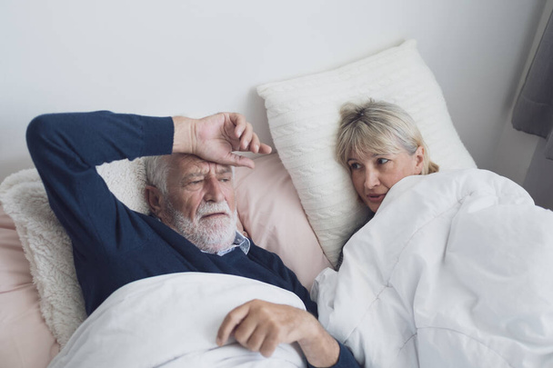 elderly couple caucasian senior man talking or discussion togeth - Photo, Image