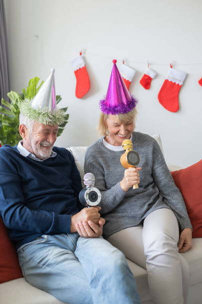 senior elderly caucasian old man and woman happy to sing a song  - Photo, Image