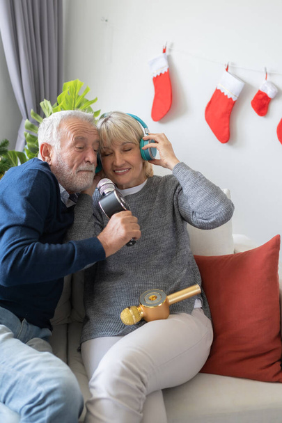 senior elderly old man and woman happy to sing song and listenin - Photo, image