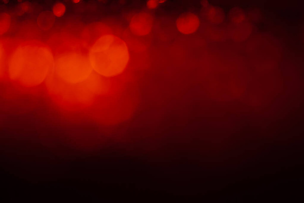 Red abstract background with bokeh defocused lights - Φωτογραφία, εικόνα