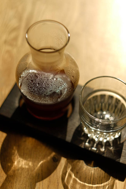 whiskey in glass and jar - Zdjęcie, obraz