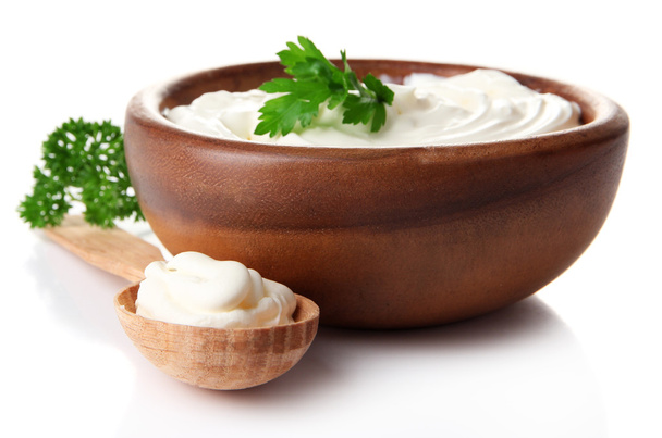 Sour cream in bowl isolated on white - Zdjęcie, obraz