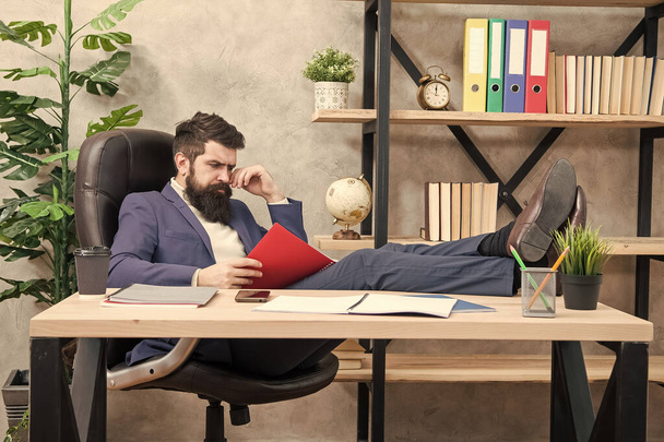 Owner of small business. Man bearded businessman sit office read business report. Analyzing financial report. Accounting and banking. Guy banker accountant learn indicators markers. Financial report - Fotoğraf, Görsel