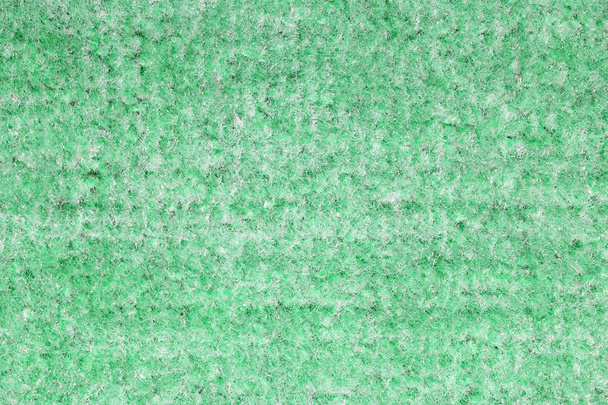 Fond de tapis vert ou racleur de pied
 - Photo, image