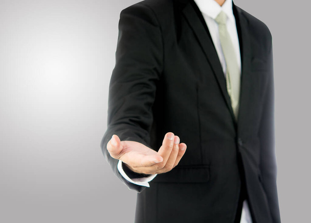 Businessman standing posture show hand isolated - Foto, afbeelding
