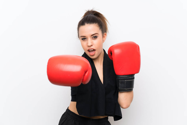 Young sport woman over white wall with boxing gloves - Fotografie, Obrázek