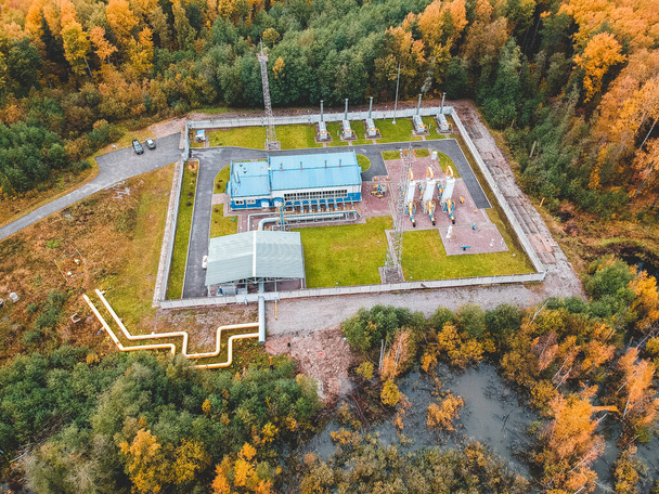 aerialphoto water treatment plants, factory in the coniferous forest. The Solid Contact Clarifier Tank type Sludge Recirculation process in Water Treatment - Photo, Image