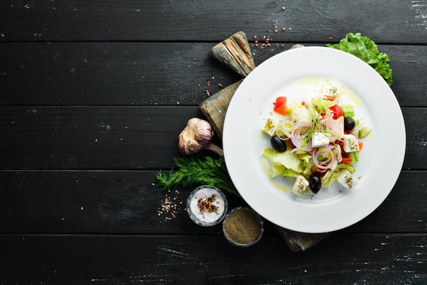 Greek salad. Feta cheese salad with olives. Top view. Free space for your text. - Fotografie, Obrázek