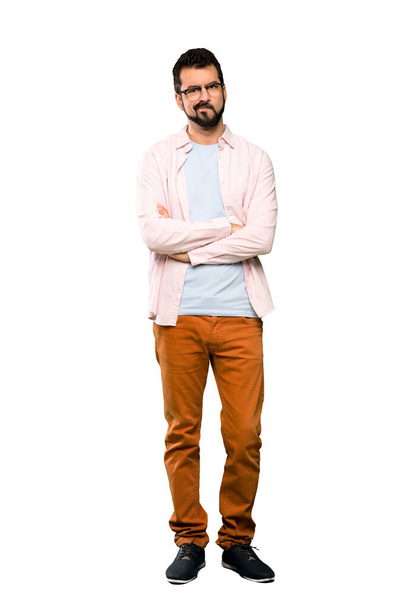 Full-length shot of Handsome man with beard feeling upset over isolated white background - Φωτογραφία, εικόνα