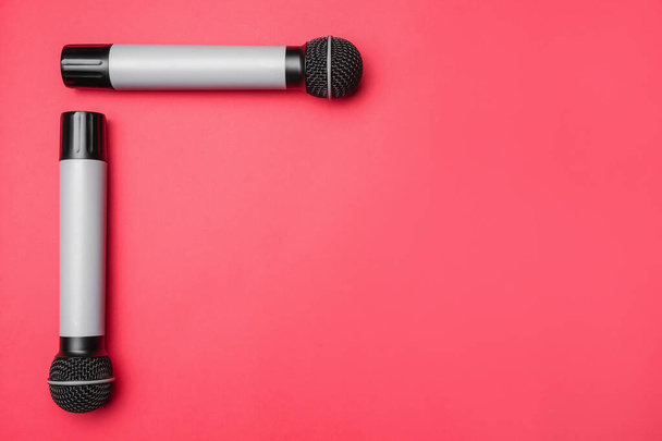 Modern microphones on color background - Photo, Image
