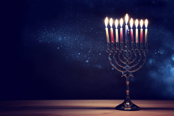 Religion image of jewish holiday Hanukkah background with menorah (traditional candelabra) and candles - Fotoğraf, Görsel
