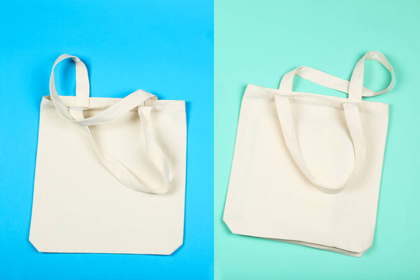 White cotton eco bags on colorful background - Fotoğraf, Görsel