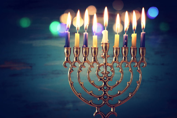 Religion image of jewish holiday Hanukkah background with menorah (traditional candelabra) and candles - Фото, изображение
