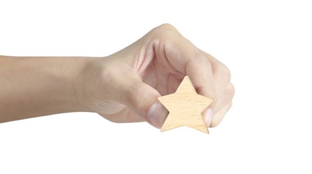 Mano de poner aumento de madera forma de cinco estrellas
 - Foto, Imagen
