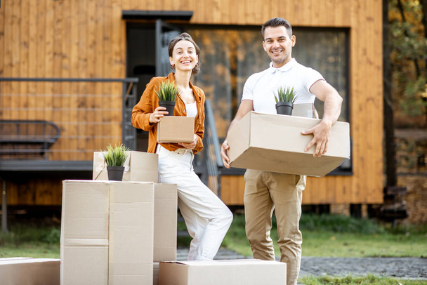 Young couple relocating into a new home - Photo, Image