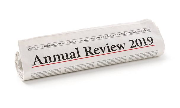 2019 Yıllık Değerlendirme başlığı ile yuvarlanmış gazete - Fotoğraf, Görsel