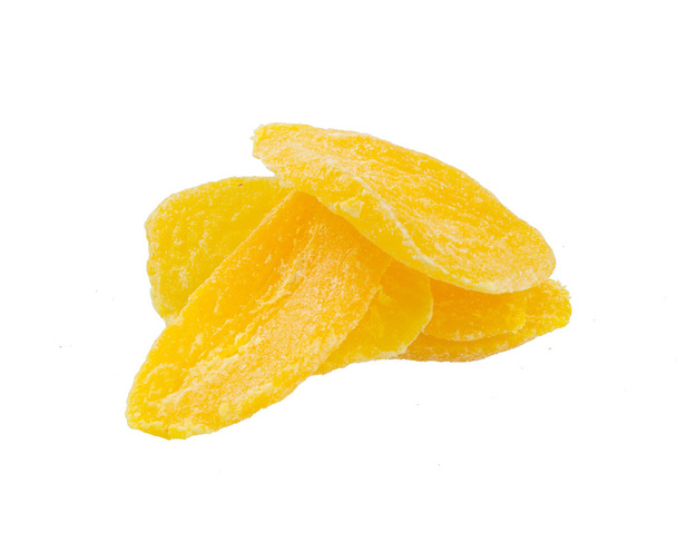 Dried Mango slices on background - Foto, afbeelding