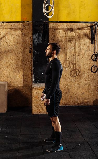 Workout Gym. Sportsman in crossfit sport club - Photo, Image