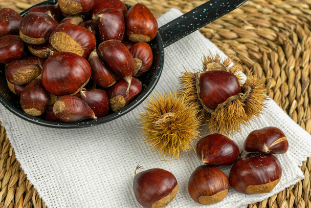roasted chestnuts rag white black table stone - Photo, Image
