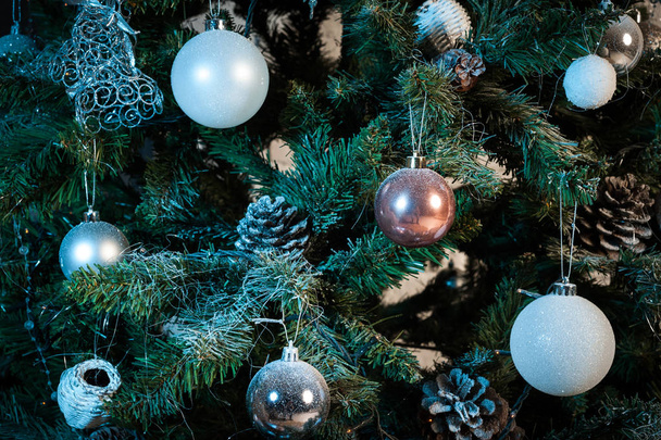 close up of christmas tree decorated with balls - Foto, imagen
