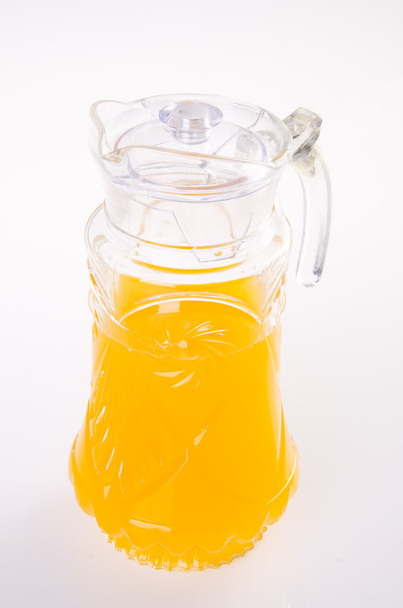 Orange juice in jar. on background - Fotó, kép