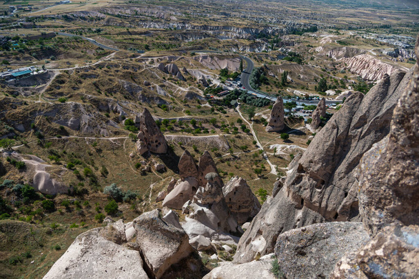Aerial view of Cappadocia town and valleys from Uchisar Castle viewpoint, Turkey. - Foto, Bild