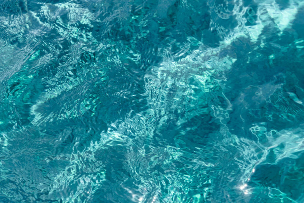 Ripples blue sea water background texture. - Фото, изображение