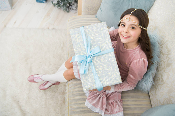 Surprise for daughter. Small kid opening box. Delivering happiness. Christmas time. Child with christmas present box. Happy new year. Celebrate christmas. Wait for santa claus. Childhood memories - Fotografie, Obrázek