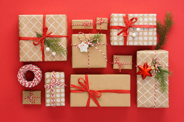 Set of Christmas gift boxes and decoration on red background. - Foto, Bild