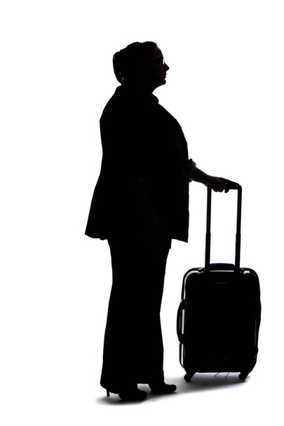 Silhouette of a curvy or plus size businesswoman on a white background for composites.  She is waiting patiently - Foto, Bild