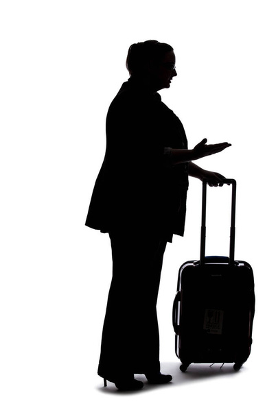 Silhouette of a curvy or plus size businesswoman on a white background for composites.  She is waiting patiently - Φωτογραφία, εικόνα