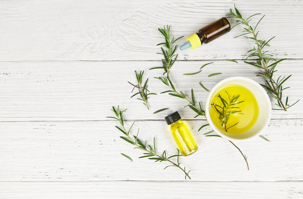 Essential oil bottle natural spa ingredients rosemary oil for ar - Photo, Image