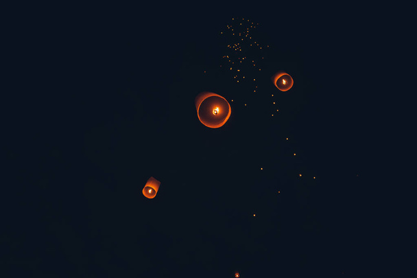 Lighting candles, lanterns in the sky at night in the Lantern Fe - Photo, Image