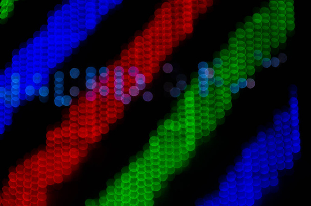 Abstract Light Bokeh Background. Defocused light dots abstract background. - Photo, image