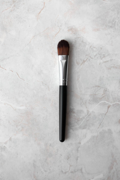 Make up brush synthetic hair with black wood handle on luxury ma - Photo, Image