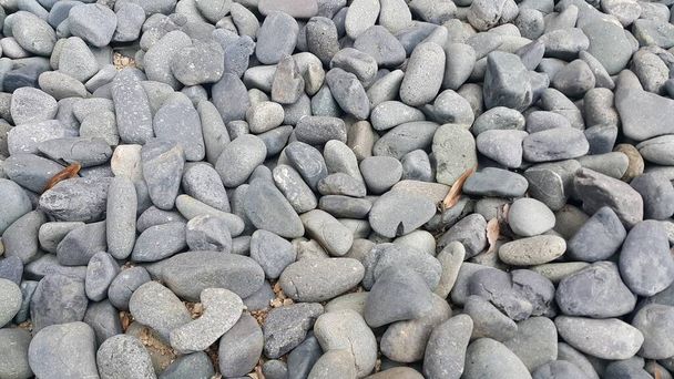 Textuur achtergrond: Rock Pebbles, kleine, afgeronde, gladde pibbles - Foto, afbeelding