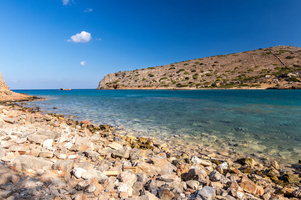 Spinalonga fortress on a clear sunny day. The ruins of leprosolium. - 写真・画像