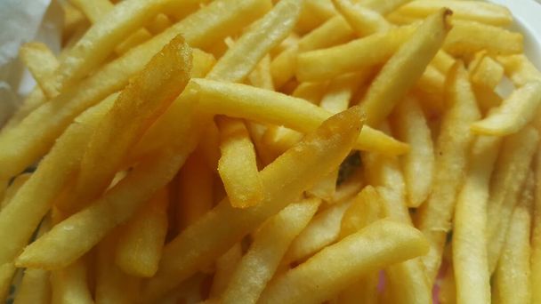 Nahaufnahme von Pommes frites oder gebratenen Scheiben - Foto, Bild