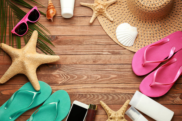 Composition with beach accessories on wooden background - Foto, immagini